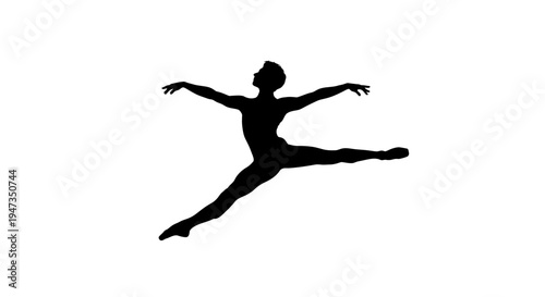 Silhouette of a Male Ballet Dancer Performing a Grand Jete Leap