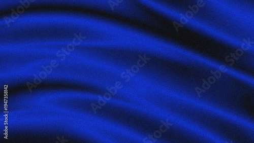 Luxury blue silk fabric texture background with soft wavy folds.