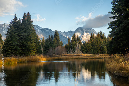 Mountain reflection in Snake River Grand Teton National Park Wyoming, USA