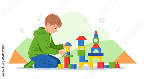 Boy playing with colorful building blocks, developing creativity and motor skills