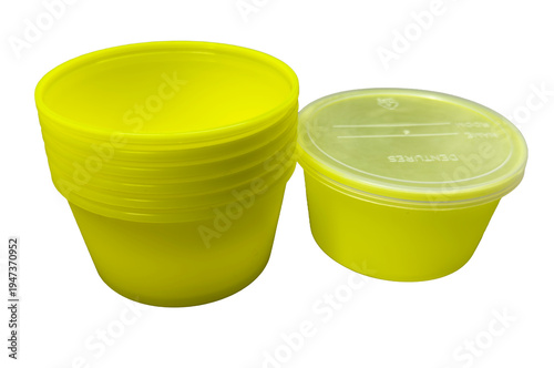 Stack of yellow denture containers with lid isolated on white background