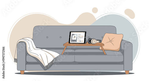 Cozy Living Room: Sofa with Tablet, Headphones, Blanket, and Pillow