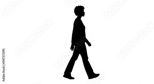 A walking person silhouette with short curly hair captures movement and human presence