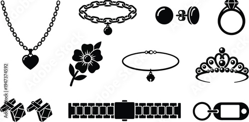 Various pieces of black jewelry, including a heart pendant necklace, chain bracelet, earrings, and a tiara, are arranged together.