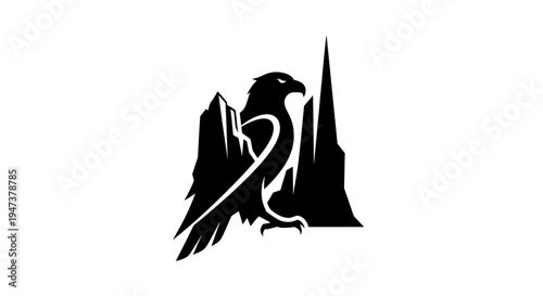 Silhouette of an eagle over mountain peaks