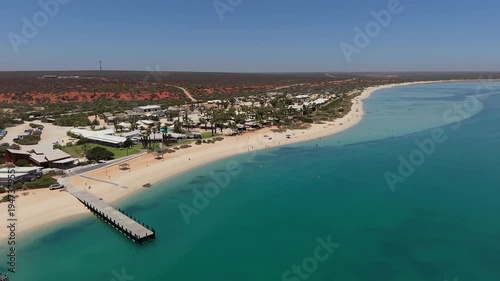 Wallpaper Mural Aerial View of Monkey Mia Dolphin Resort Beach, Jetties and Turquoise Water Along a Quiet Coastal Resort Village, Denham, Francois Peron NP, Shark Bay, Western Australia. Torontodigital.ca