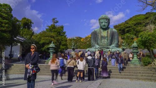 KAMAKURA, JAPAN. DEC 2025. TIMELAPSE. Panoramic view of the Giant Buddha bronze statue at Kōtoku-in Temple in Kamakura Prefecture, Japan. This statue is an attraction that draws thousands of tourists 