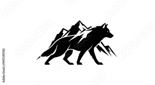 Wolf silhouette against mountain peaks