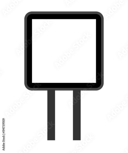 An empty billboard sign stands alone in a vast urban landscape.