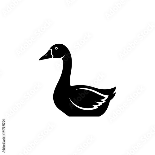 Elegant black silhouette of a swimming duck with a curved neck and sleek body