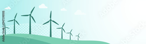 Row of wind turbines on rolling green hills under a clear blue sky with clouds