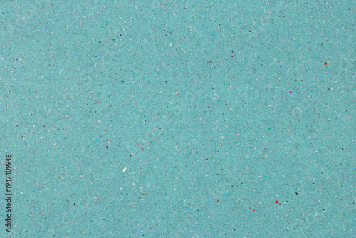 Quadro su tela Blue recycled paper texture background with organic colorful particles