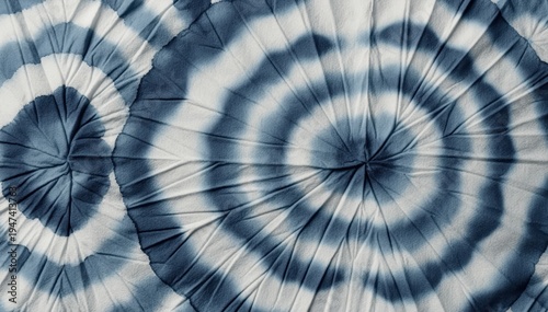 Abstract Indigo Circles: A captivating display of indigo spiral patterns, creating a mesmerizing visual experience. Evoking a sense of flow and artistic expression.