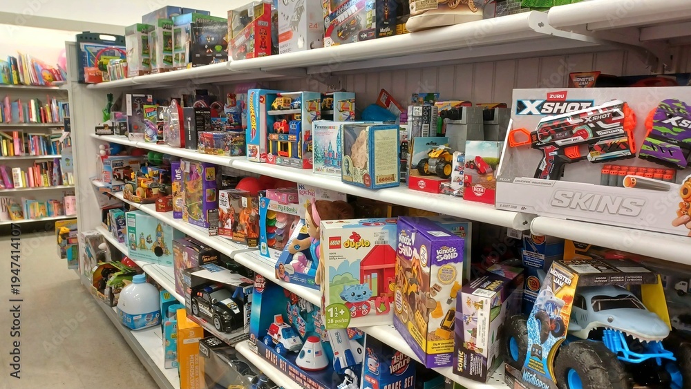 Fototapeta premium Shelves Full of Toys and Games in Store