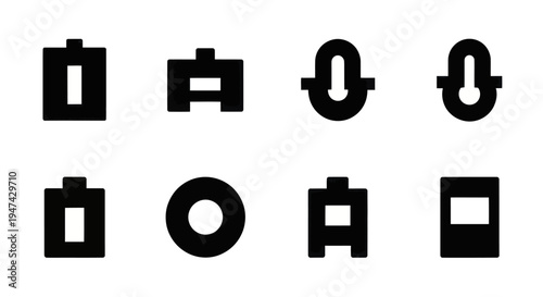 Abstract black and white geometric shapes arranged in a grid pattern.