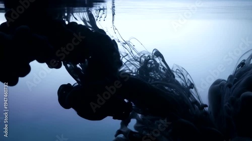 Dark Ink Cloud Dissolving in Clear Water Abstract Motion.