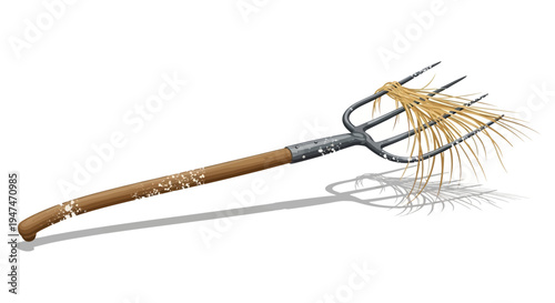 Pitchfork with straw on white background