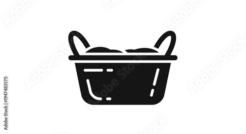 Black laundry basket icon with handles, filled with clothes, simple vector graphic