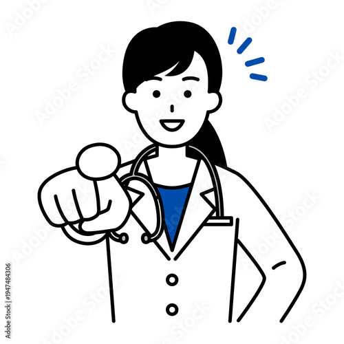 笑顔で指差す医師の女性