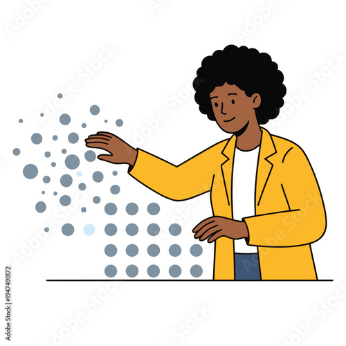 A woman in a yellow coat interacts with floating particles indoors.