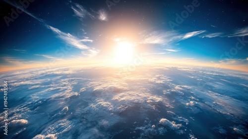 Sunrise over earth atmosphere with clouds and sun