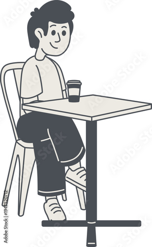 Pria muda duduk santai di meja kafe menikmati kopi