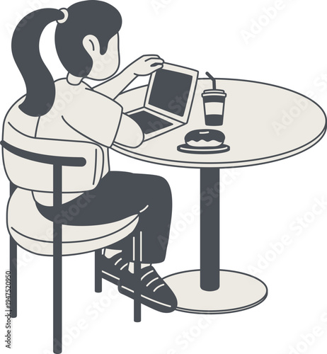 Woman using laptop comfortably in coffee shop