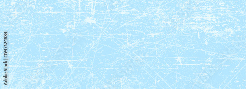 Scratched ice surface texture. Blue ice background with skate traces, cracks, scratches. Rough winter sport rink backdrop. Frozen lake or pond water wallpaper with dots, spot and lines. 