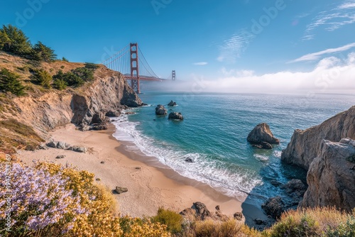 Breathtaking View of Golden Gate Bridge Surrounded by Rocky Shores, Beach, and Lush Greenery on a Sunny Day in San Francisco, California