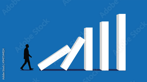 Calm businessman walking towards a row of falling white blocks that resemble a declining bar graph or domino effect.