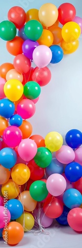 A whimsical arrangement of multi-colored balloons forms a festive backdrop, perfect for events and decorations,  design,  party