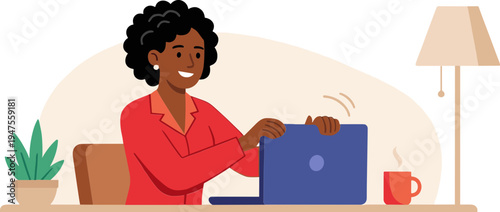 Woman sits at desk working on laptop with coffee and lamp nearby indoors.