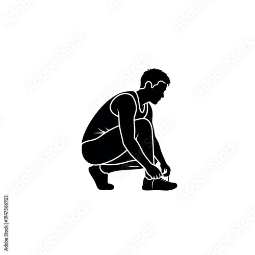 Athlete tying shoelaces before workout.