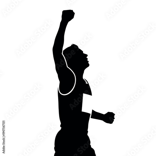 Silhouette of a triumphant man raising his arm in victory.