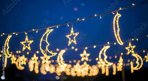 A string of lights with stars and moons on it illustration