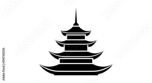 Black silhouette of a pagoda tower.