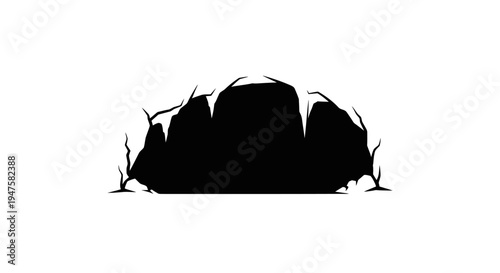 Black silhouette of rock formation.