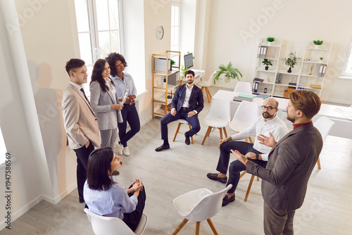 Professional office work people team is seen conducting a business group meeting in the office. This image exemplifies teamwork, communication, and professional collaboration within the workplace.
