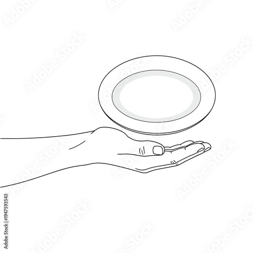 A hand delicately holds a circular plate above a surface