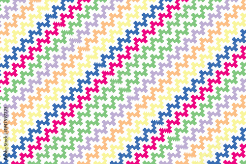 A vibrant and colorful puzzle piece pattern with interlocking shapes in various hues