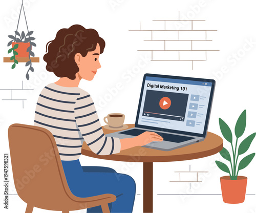 Woman sitting at a table watching a digital marketing video on her laptop.