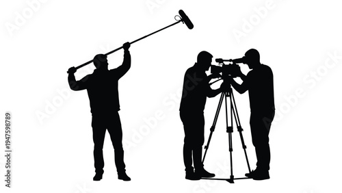 Three people working on a film set with equipment