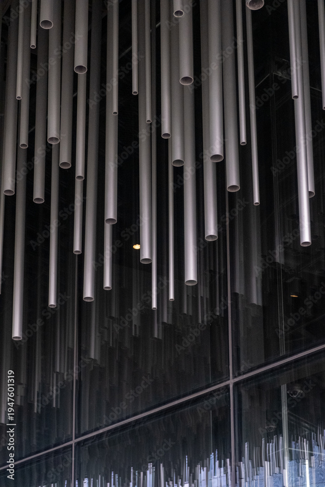 Obraz premium Suspended aluminum pipes, abstract tube for background.