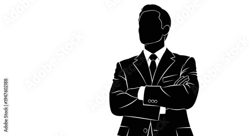 Businessman in suit with crossed arms.