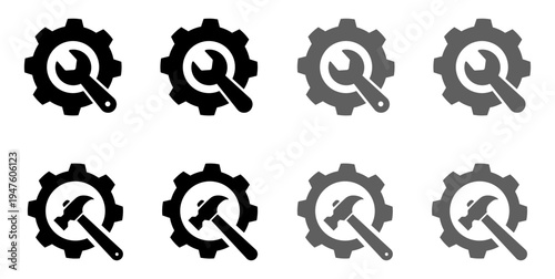 Gear icons with wrench and hammer symbols, representing construction, repair, industry, and technical services. Isolated on white background.