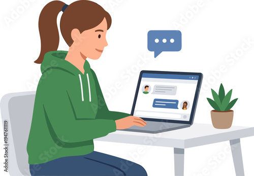 Woman sits at desk chatting on laptop with plant nearby indoors