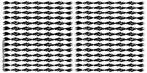 Repetitive black chevron pattern filling the entire frame