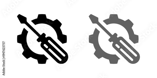 A graphic icon featuring a screwdriver crossed with a gear, symbolizing maintenance, repair, technical support, and industry. Available in black and gray.