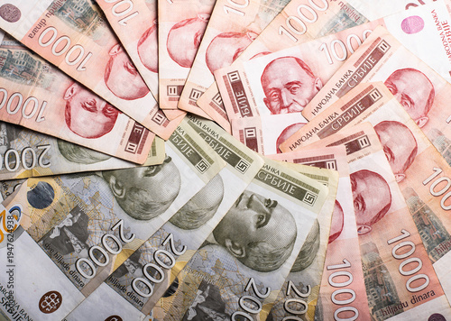 Heap of Serbian Dinar banknotes. Top View. No people.