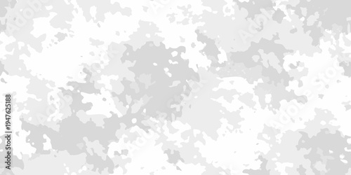 Abstract grayscale background with mottled textured paint splatters